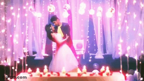 Bride And Groom Dancing With Candles GIF