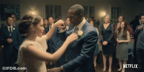 Bride And Groom Dancing With Netflix Logo GIF
