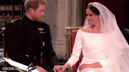 Bride And Groom Holding Hands And Smiling GIF