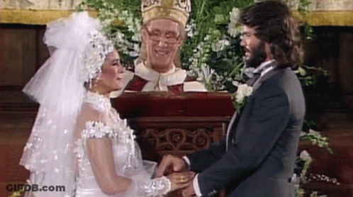 Bride And Groom Holding Hands In Front Of Priest Picture GIF