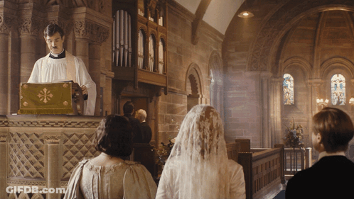 Bride And Groom In Church With Priest GIF