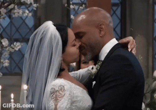 Bride And Groom Kiss At Church Wedding GIF