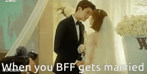 Bride And Groom Kissing Under When You BFF Gets Married Sign GIF