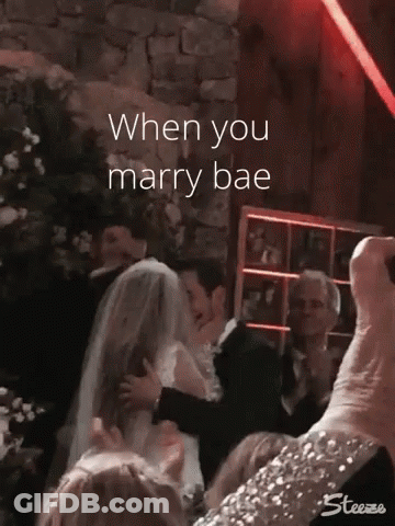 Bride And Groom Kissing With Caption When You Marry Bae GIF