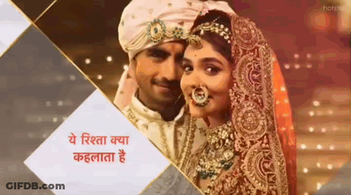 Bride And Groom Standing Next To Hotstar Sign GIF