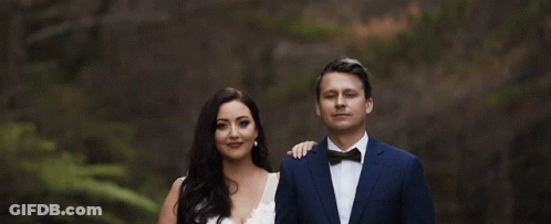 Bride And Groom Standing Together GIF