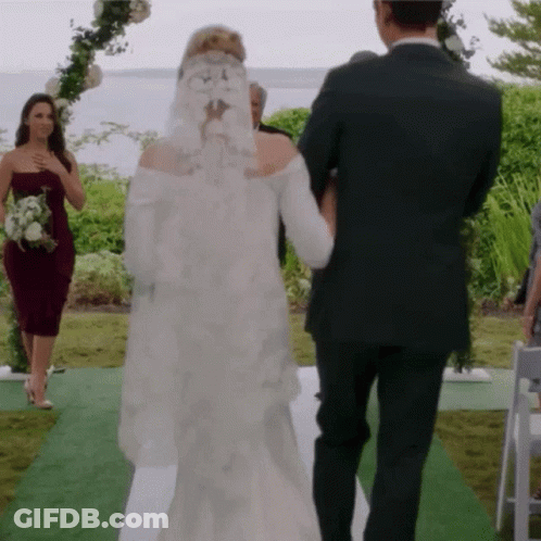 Bride And Groom Walking Down The Aisle GIF