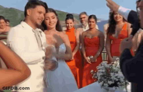 Bride And Groom Wedding Party Looking On GIF