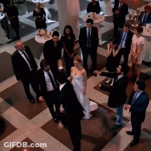 Bride And Groom With Guests GIF