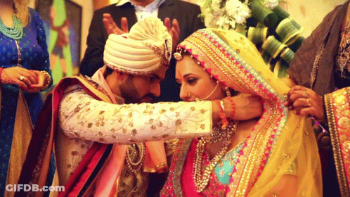 Bride And Groom With Yellow Veil GIF