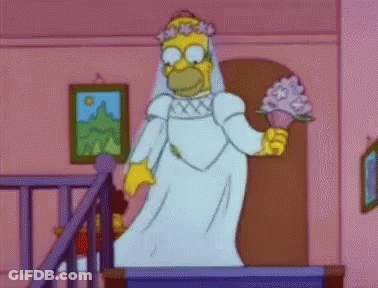 Bride In Wedding Dress Holding Champagne While Woman Toasts GIF
