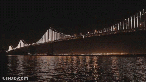 Bridge Over Water With Lights GIF