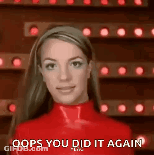 Britney Spears In Red Latex Outfit Smiling GIF