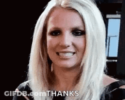 Britney Spears Is Smiling And Giving A Thanks Gesture . GIF