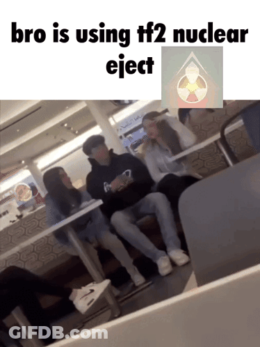 Bro Is Using Tf2 Nuclear Eject On A Picture Of A Group Of People GIF