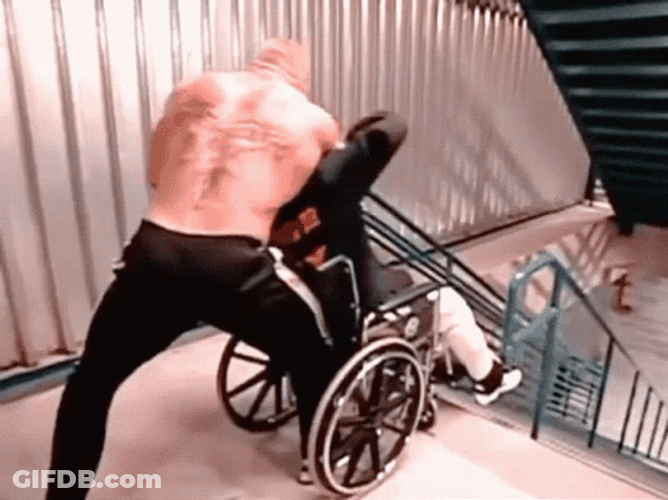 Brock Lesnar Pushed Wheelchair GIF