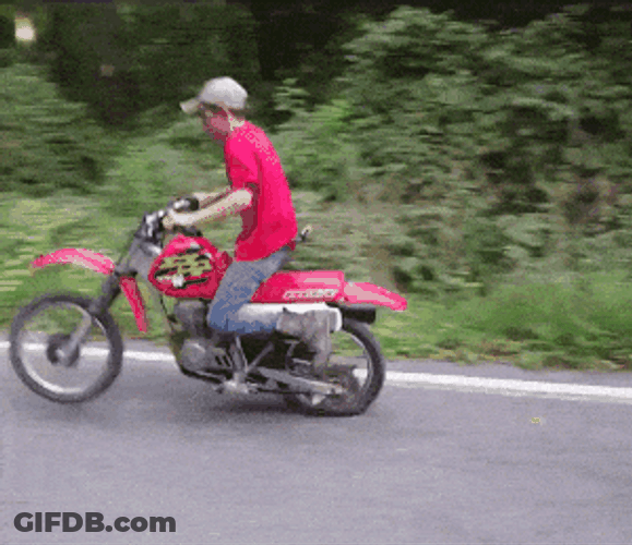 Broken Motorcycle Still Ridden By Man GIF