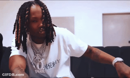 Brown And White Dog With Blue Collar Beside Man GIF