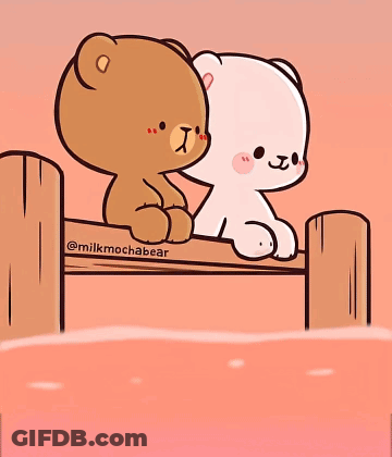 Brown And White Teddy Bear Sitting On Fence GIF