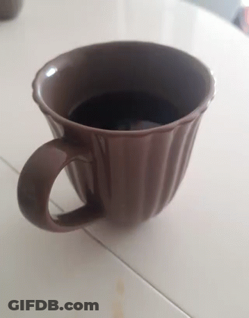 Brown Coffee Cup On Table GIF