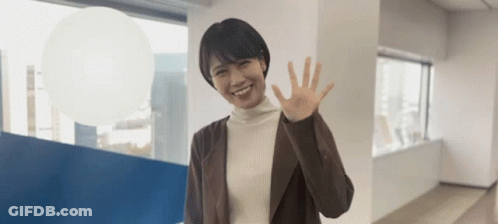 Brown Jacket Woman Smiling And Waving GIF