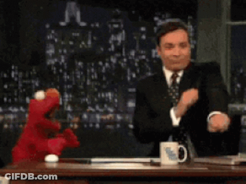 Brown Teddy Bear Holding Microphone GIF
