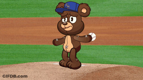Brown Teddy Bear In Blue KB Hat On Baseball Field GIF