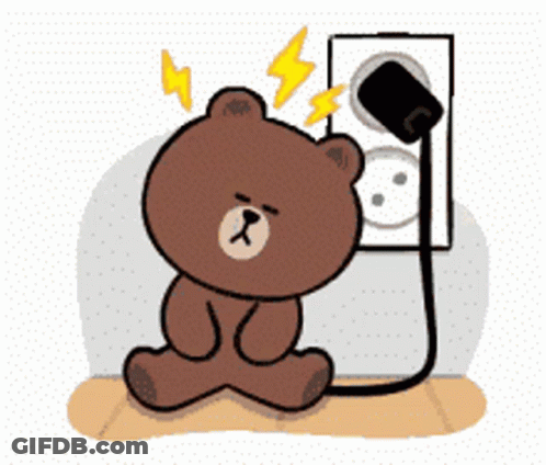 Brown Teddy Bear Sitting In Front Of Electrical Outlet With Lightning Bolts GIF