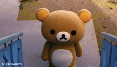 Brown Teddy Bear Standing On Steps GIF