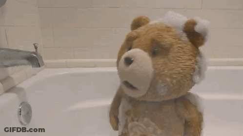 Brown Teddy Bear Taking Bath GIF