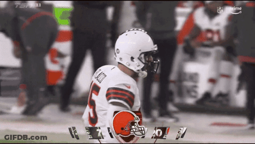 Browns Advertisement With Players And Referee GIF