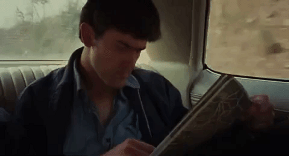 Bruce Campbell Reading Evil Dead GIF