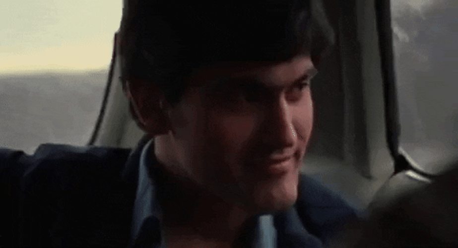 Bruce Campbell Smirk On Evil Dead GIF