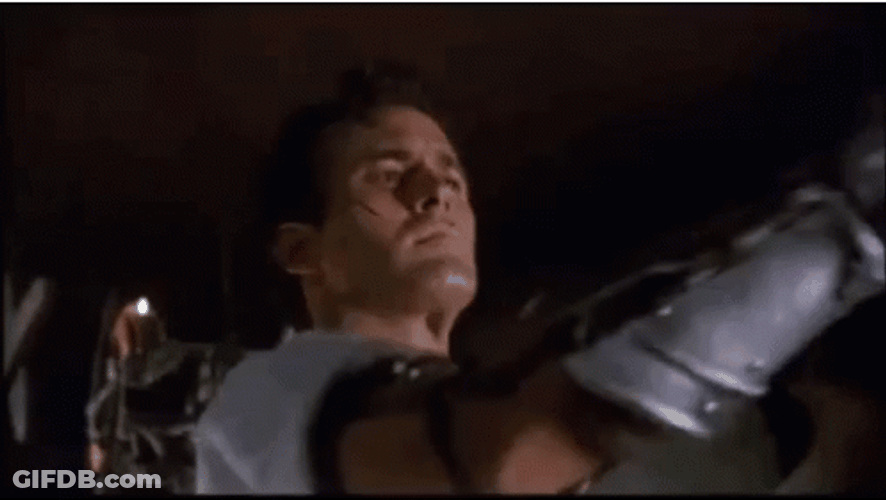 Bruce Campbell With Iron Hand Groovy GIF