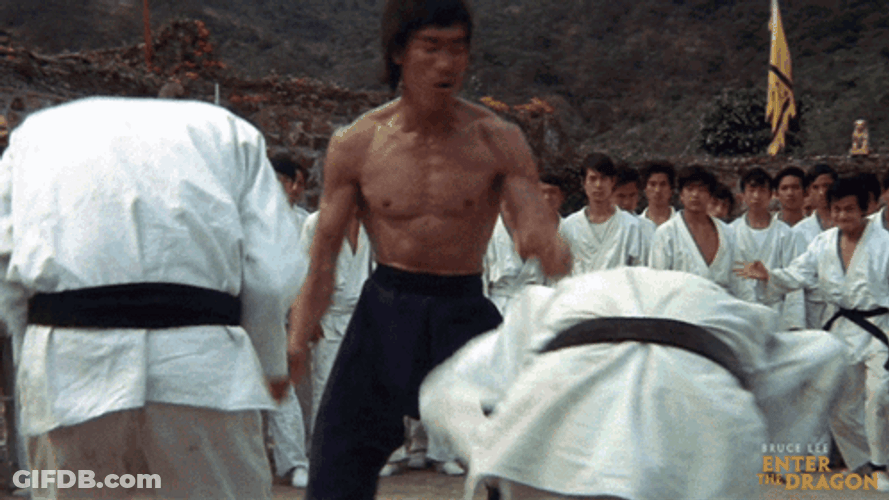 Bruce Lee Drop Kick On People GIF