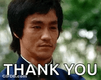 Bruce Lee Giving Thank You Gesture GIF