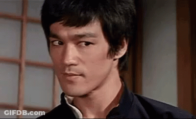 Bruce Lee In Black And White Shirt GIF