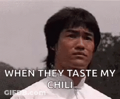 Bruce Lee Is Making A Funny Face While Talking About Chili . GIF