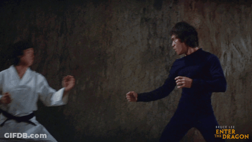 Bruce Lee's Enter The Dragon Two Martial Arts Fighters GIF