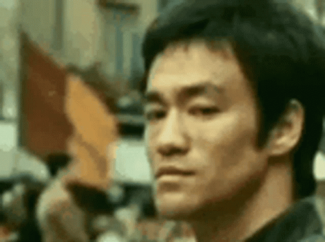 Bruce Lee Small Smile On GIF