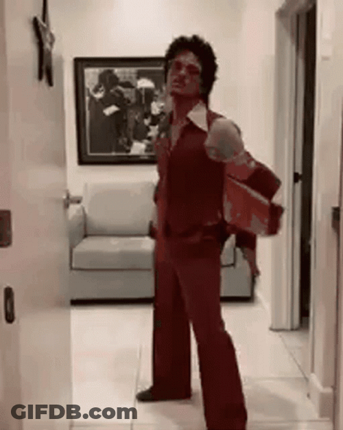 Bruno Mars Dropping Coat GIF