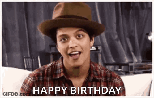 Bruno Mars In Hat And Plaid Shirt Saying Happy Birthday GIF