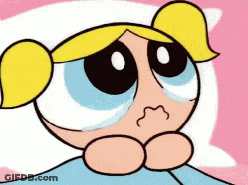 Bubbles From The Powerpuff Girls Is Laying In Bed With A Pillow And Crying . GIF
