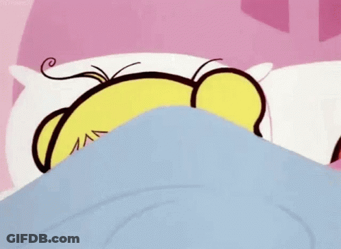Bubbles From The Powerpuff Girls Is Sleeping In A Bed With A Blue Blanket . GIF
