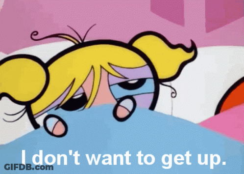 Bubbles From The Powerpuff Girls Laying Under A Blanket With The Words I Don 'T Want To Get Up GIF