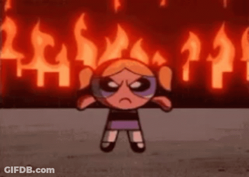 Bubbles Powerpuff Girl In Front Of Fire GIF