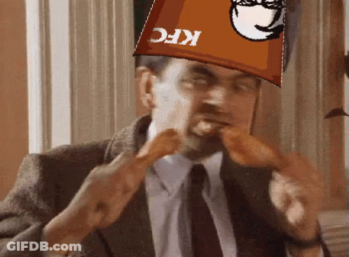 Bucket Of Fried Chicken On Wooden Table GIF