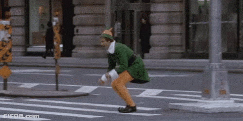 Buddy The Elf Street Hopping GIF