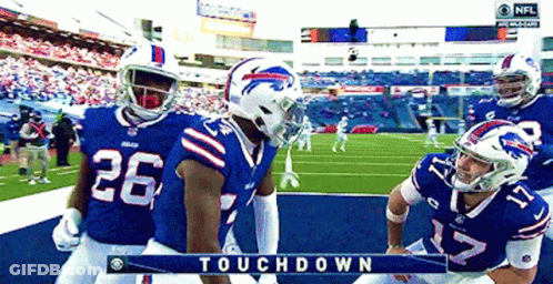 Buffalo Bills Football Players Standing On Field GIF