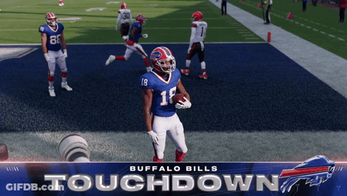 Buffalo Bills Player Holding Football In Front Of Touchdown Banner GIF